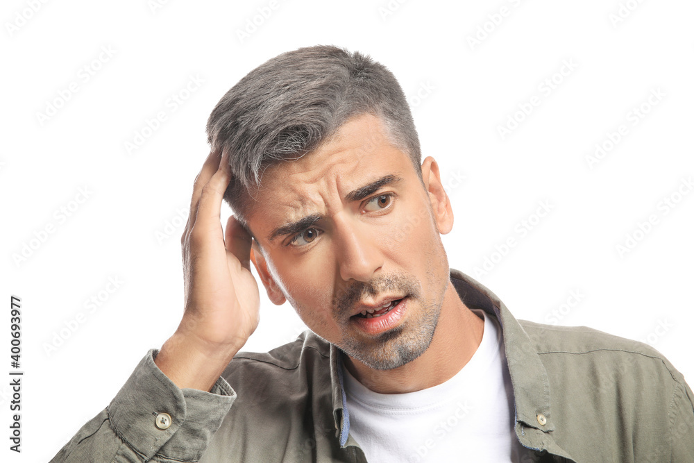 Stressed man with graying hair on white background Stressed man with graying hair on white background