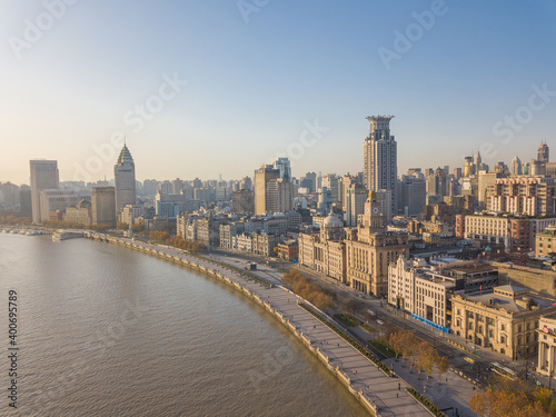 Aerial view of the bund and modern skyline in Shanghai, China, at sunrise.