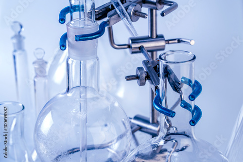 Flask on a tripod. Laboratory analysis equipment. Chemical laboratory, glassware test-tubes.