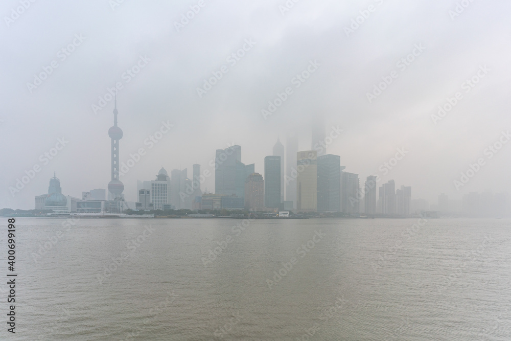 The bund in Shanghai, on a thick foggy day.