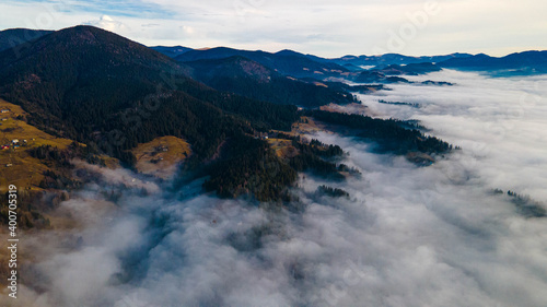 mountains tops high above clouds fog © Андрей Трубицын