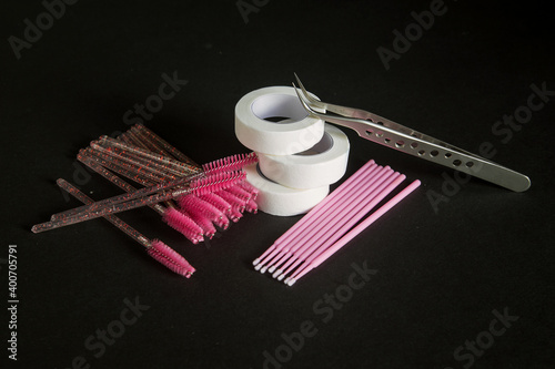 equipment for eyelash extensions on a dark background. 
