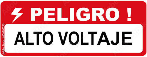 A sign that says in Spain Language : DANGER HIGH VOLTAGE PELIGRO ALTO VOLTAJE