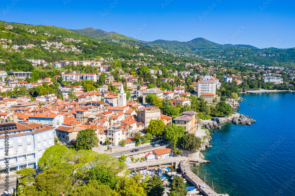 Croatia, beautiful town of Lovran, sea walkway, aerial panoramic view in Kvarner bay coastline, popular tourist destination