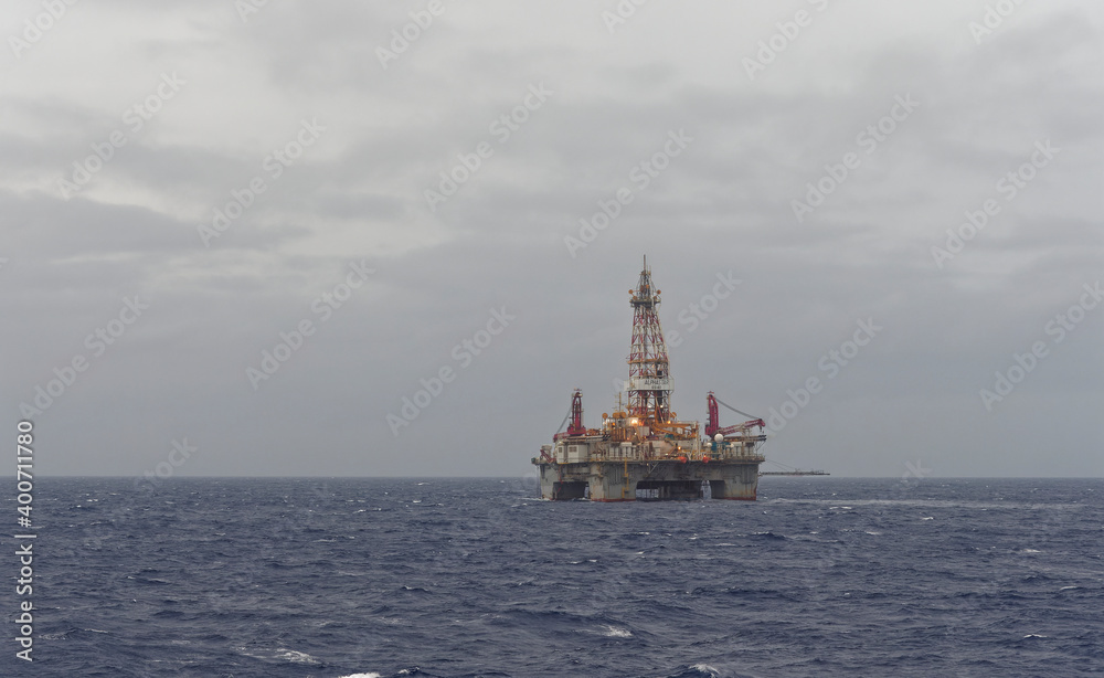 The Alpha Star Drilling Rig on location on the Albacora Field offshore Brazil in the South Atlantic on a grey evening in fresh weather.
