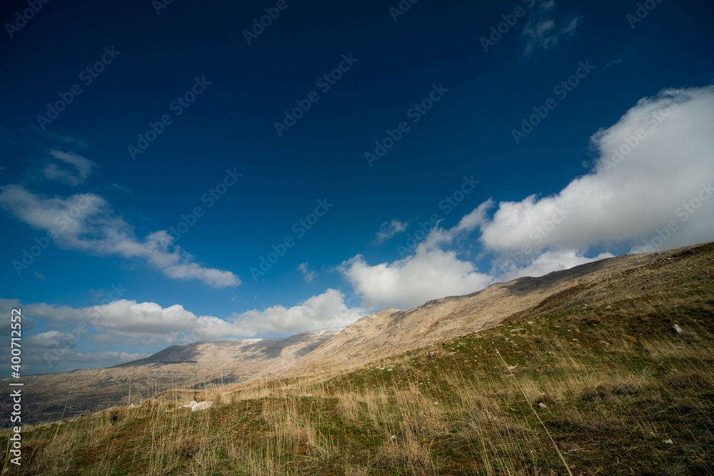 grassland and blue cloud sky in the Lebanon mountain region Sannine