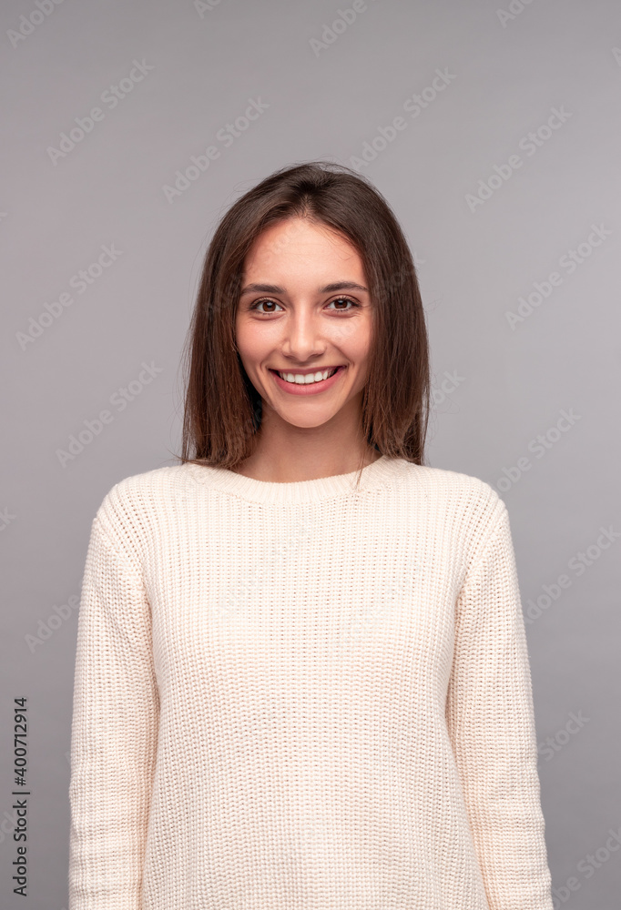Cheerful young woman smiling for camera Cheerful young woman smiling for camera