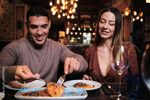 Young couple on a date at the restaurant.