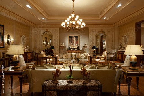 Billede på lærred Showroom exhibited modern production furniture in classical period style arranged in a lavishly decorated interiors