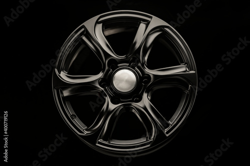 matte black alloy wheel, close-up front view. Powerful wheel for off-road vehicles