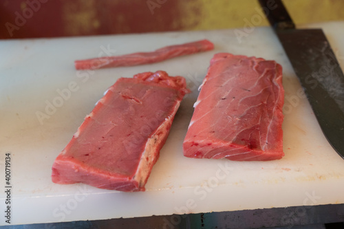 Tuna chunks on a cutting board