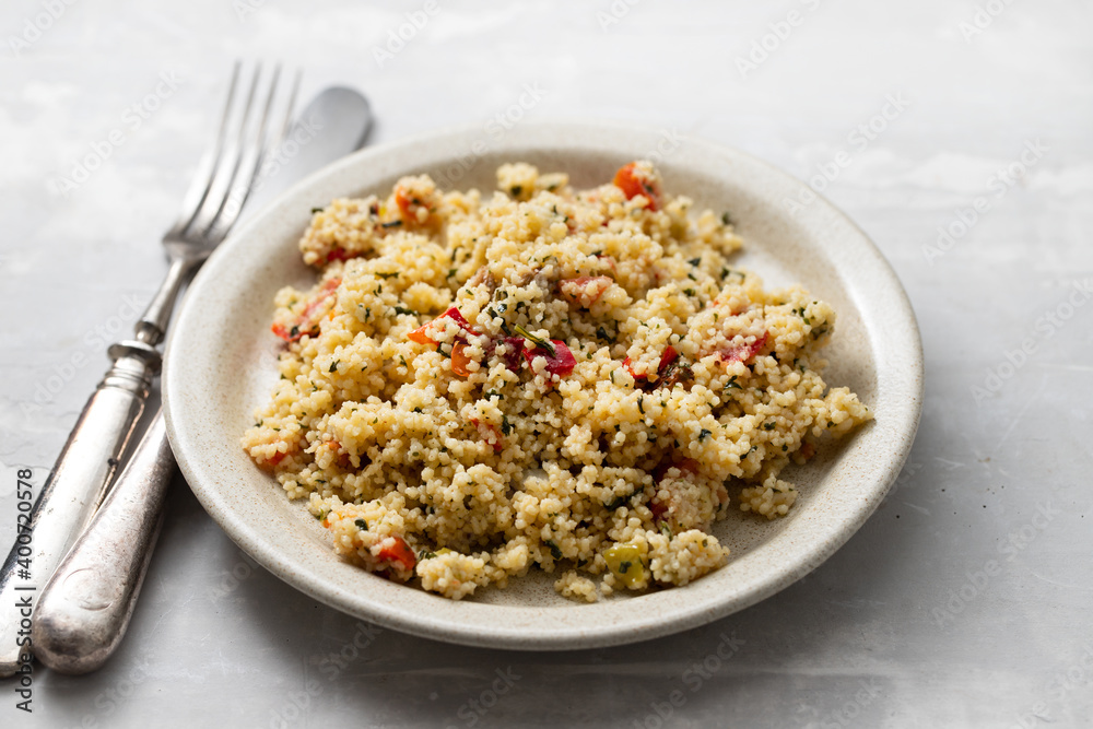 tabbouleh on small plate on ceramic background tabbouleh on small plate on ceramic background