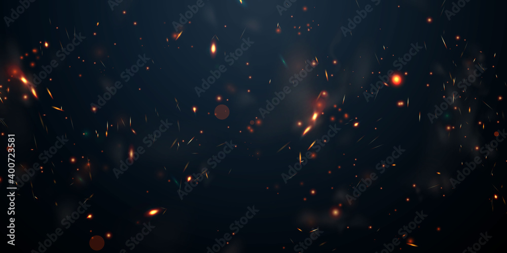 Sparks fly up Glowing particles on a black background and with flames