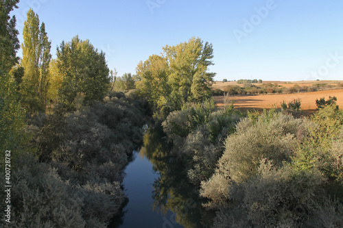The Valdavia river near the Abanades aqueduct in Castilla, Melgar de Fernamental, Burgos, Spain photo
