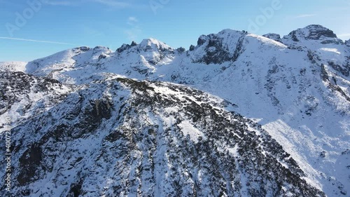 Aerial winter view of Kupens and Orlovets peaks, Rila Mountain, Bulgaria photo