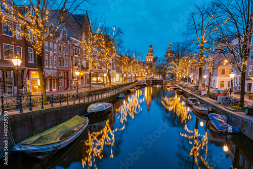 Photography Amsterdam Netherlands canals with Christmas lights during December, canal historical center of Amsterdam at night