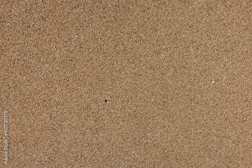 wet sand surface on the beach