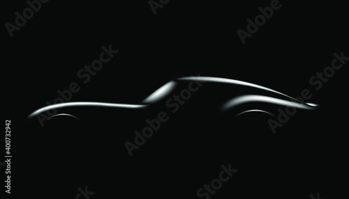 Silhouette of black sports car on dark background