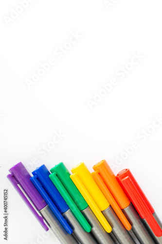Rainbow pens put together. Represents a symbol of queer sex