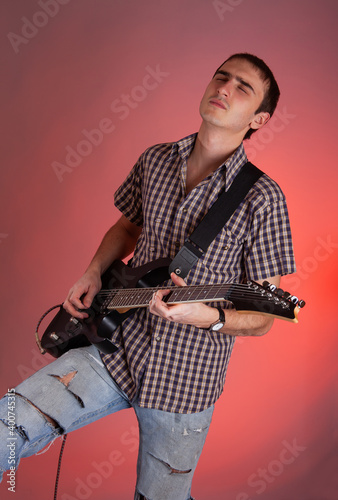 Young man playing the guitar