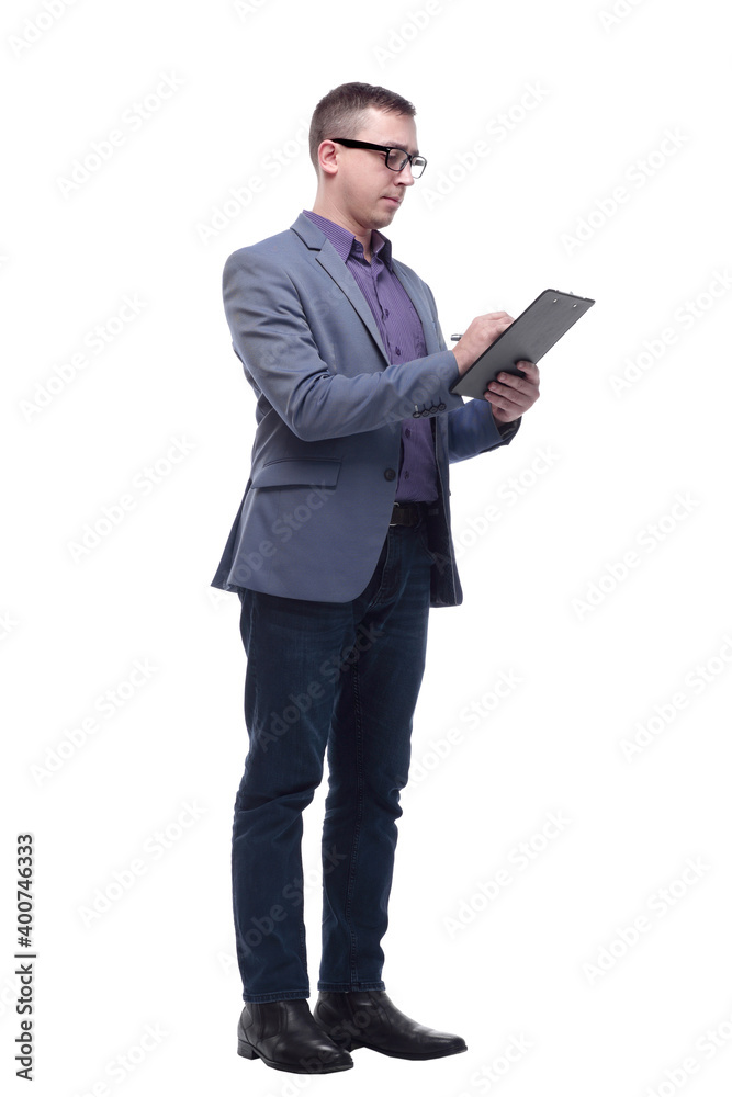 Handsome happy businessman or banker taking notes on clipboard as paperwork