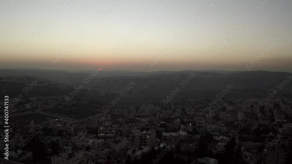 Sunset behind Jerusalem Mountains, aerial view
drone view from East Jerusalem with building and mountains, Israel,December, 2020
Sunset behind Jerusalem Mountains, aerial view
drone view from East Jerusalem with building and mountains, Israel,December, 2020