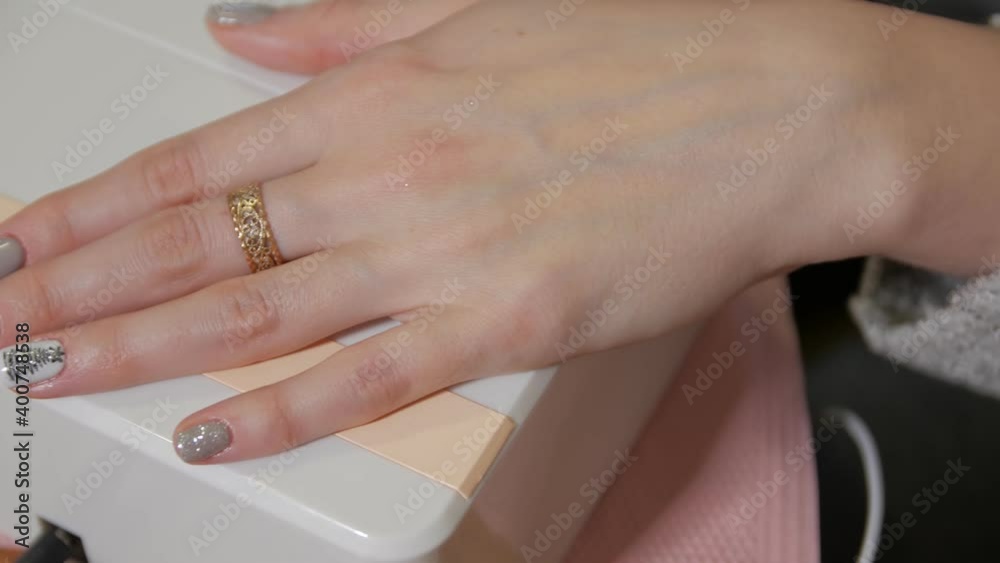 Christmas tree drawing and star nails manicure art closeup pan shot Christmas tree drawing and star nails manicure art closeup pan shot