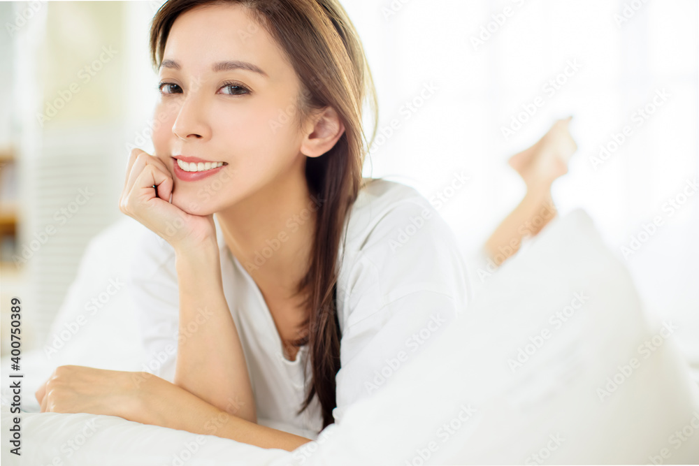 beautiful Asian young woman relaxing on bed beautiful Asian young woman relaxing on bed
