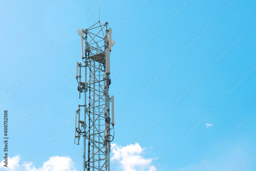 communication tower against a blue sky