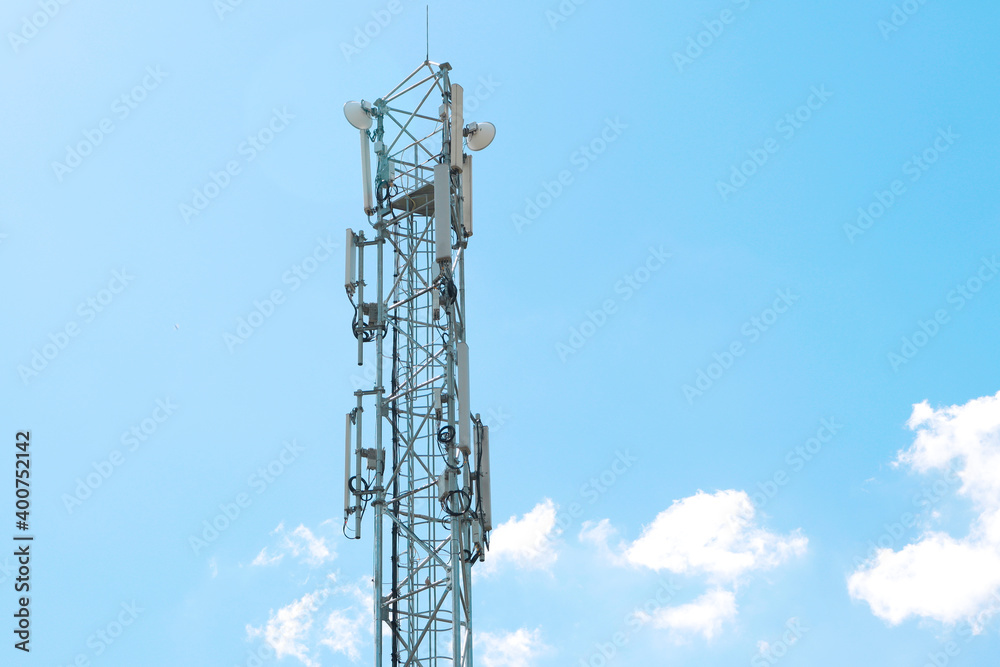 communication tower against a blue sky