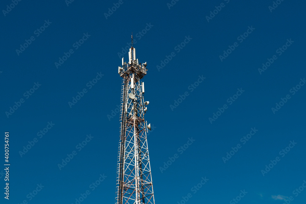 communication tower against a blue sky communication tower against a blue sky