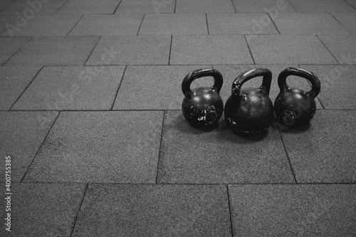 three black iron kettlebell for weight training