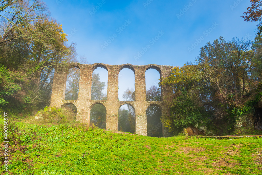 Ruins of ancient roman acqueduct in Italy