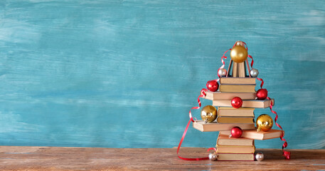 books as christmas gift,christmas present,reading,literature,education,making a gift concept, panoramic,free copy space