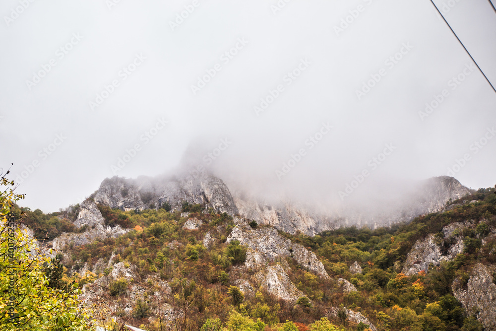 Beautiful nature mountain landscape view. The Ovcar-Kablar Gorge in western Serbia. Autumn day. Cloudy sky. Beautiful nature mountain landscape view. The Ovcar-Kablar Gorge in western Serbia. Autumn day. Cloudy sky.