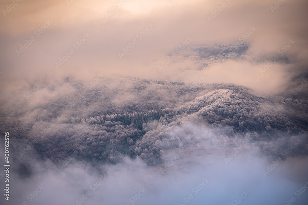 Mountain peaks over the clouds. An unigue vista. Bieszczady National Park. Carpathians. Poland. Mountain peaks over the clouds. An unigue vista. Bieszczady National Park. Carpathians. Poland.