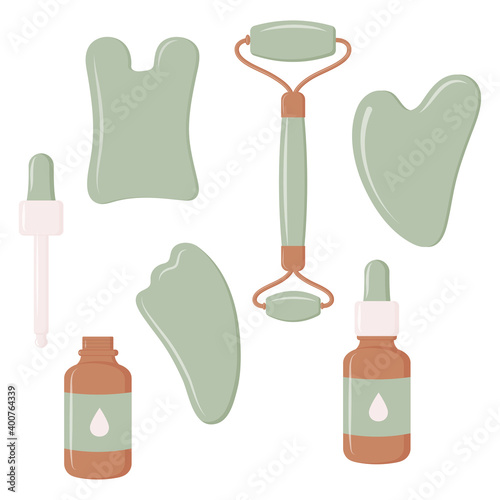 Set of tools for Gua Sha massage. Gua sha scrapers, facial oil, massage roller. Home beauty routines