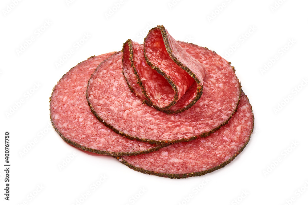 Peppered salami slices, isolated on white background Peppered salami slices, isolated on white background