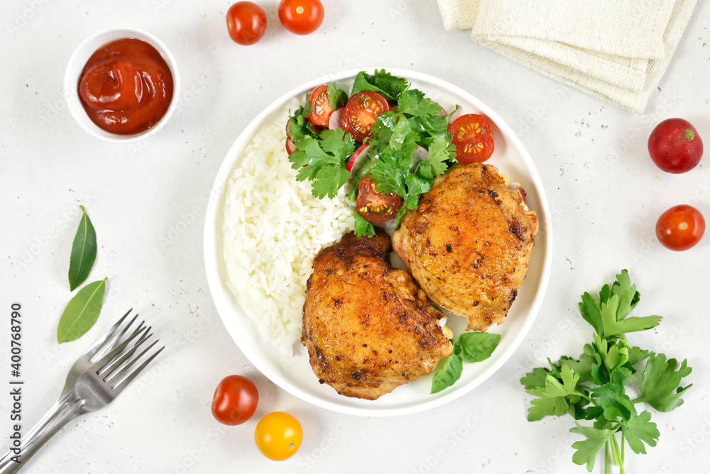 Fried chicken thighs with vegetables and rice Fried chicken thighs with vegetables and rice