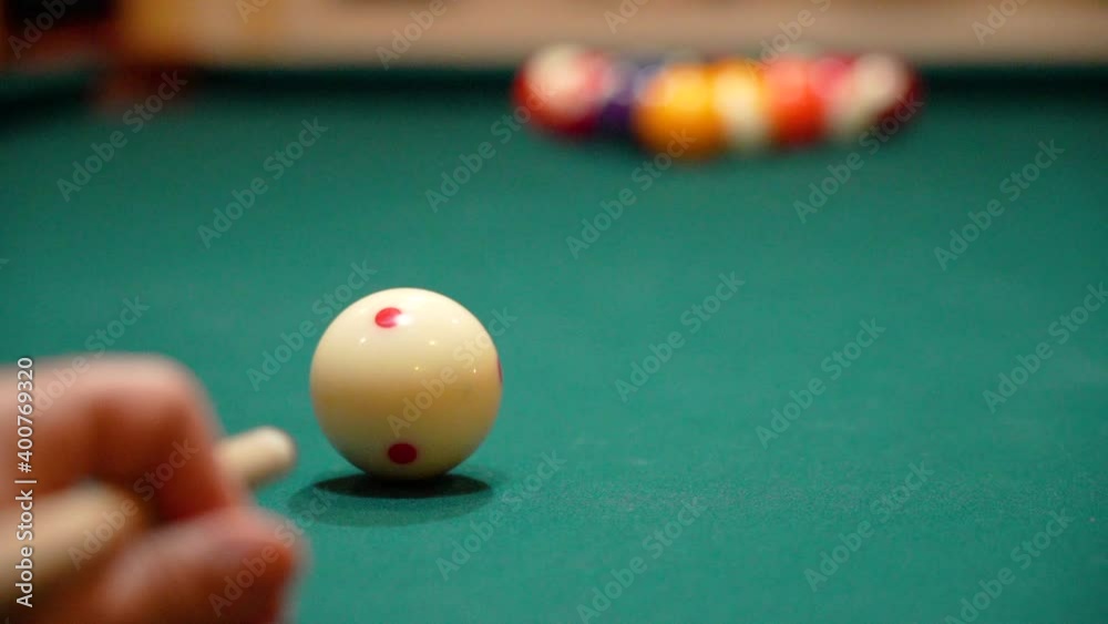 Slow Motion Billiards Low Angle Close Up as Person Breaks a Rack of 8