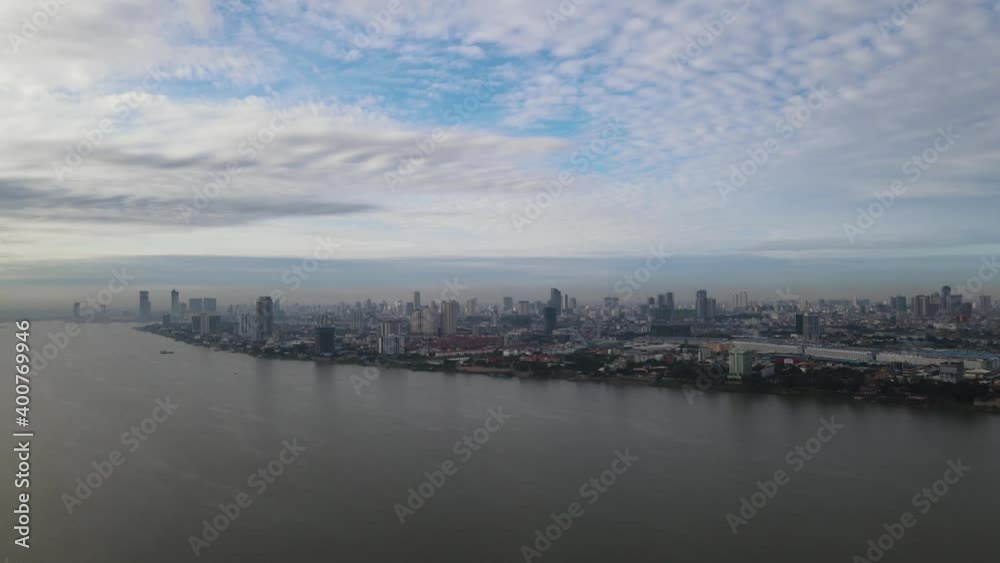 Phnom Penh city skyline and Chroy Changvar along the Mekong river in Cambodia, drone footage moving fowards 1-2 Phnom Penh city skyline and Chroy Changvar along the Mekong river in Cambodia, drone footage moving fowards 1-2