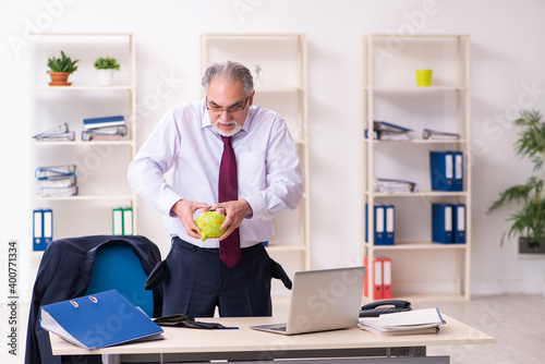 Old businessman employee in bankruptcy concept
