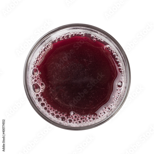 Top view of a grape juice glass isolated over white background
