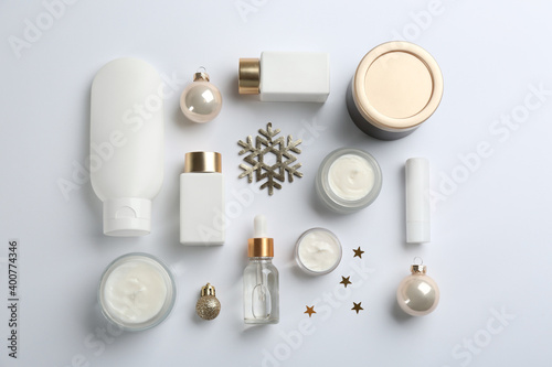 Set of different cosmetic products on white background, flat lay. Winter care