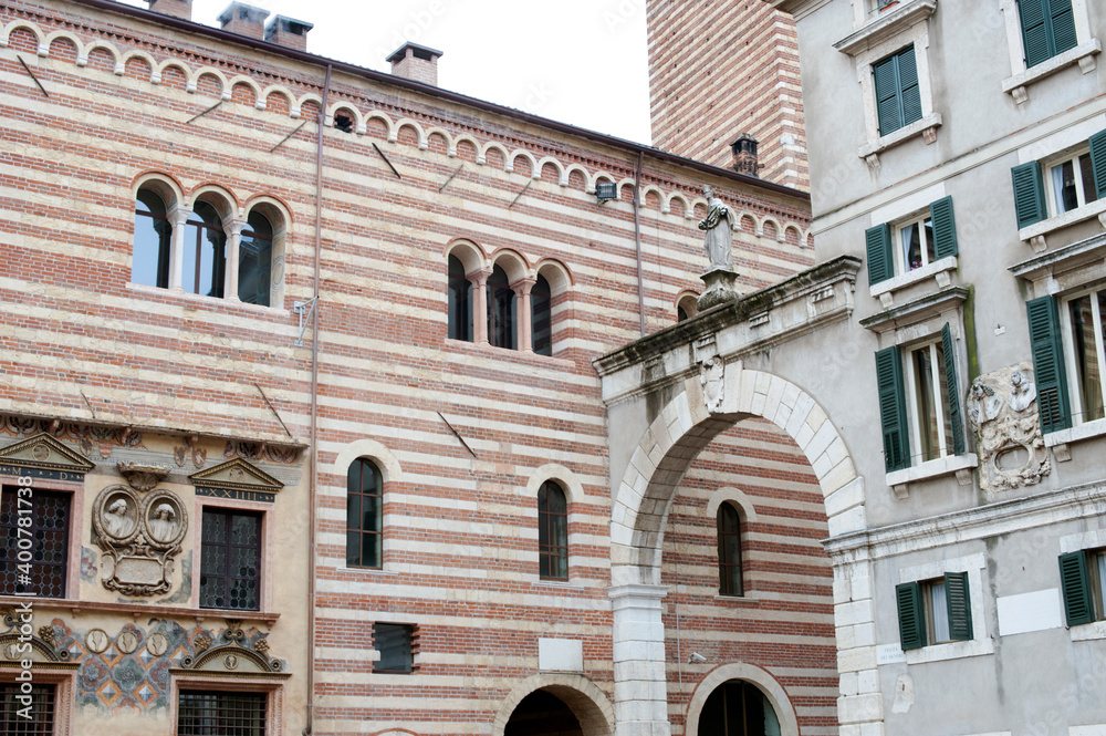 Historical buildings . Detail of the facade of the Palazzo della Ragione and Palazzo Domus Nova in the Piazza dei Signori, Verona, Italy. Historical buildings . Detail of the facade of the Palazzo della Ragione and Palazzo Domus Nova in the Piazza dei Signori, Verona, Italy.