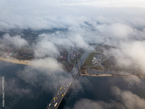 Aerial drone view. North bridge in Kiev, shrouded in morning fog.