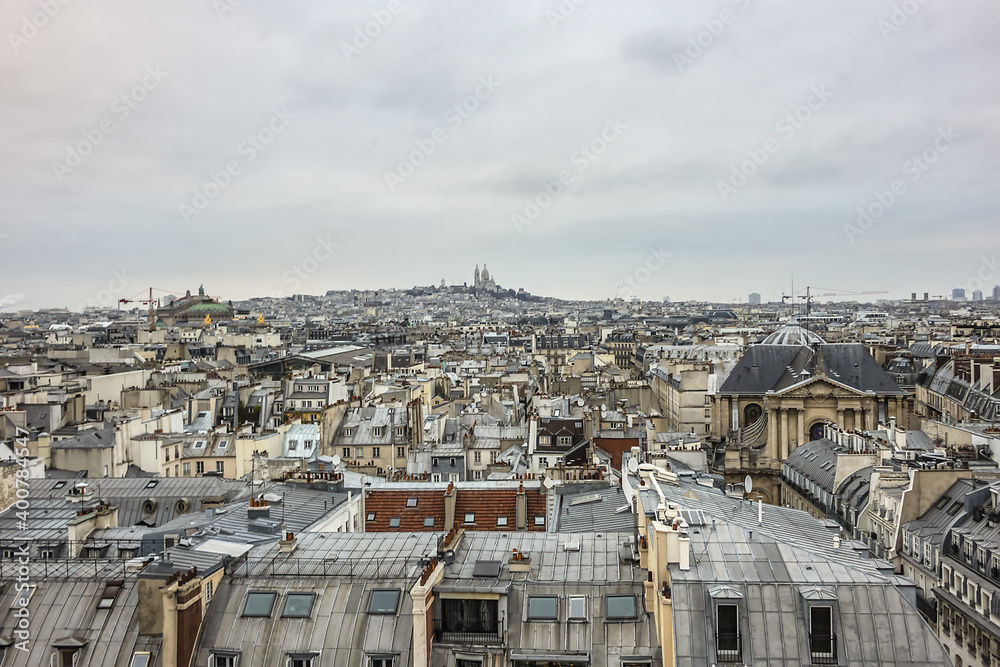 Fototapeta premium Paris Panorama. Montmartre hill with Sacre-Coeur Cathedral in the background. Paris, France.