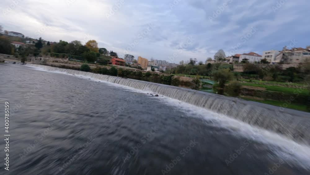 High-speed fpv drone flight over Tamega river waters at Amarante. Portugal High-speed fpv drone flight over Tamega river waters at Amarante. Portugal