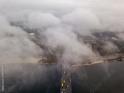 Aerial drone view. North bridge in Kiev, shrouded in morning fog.