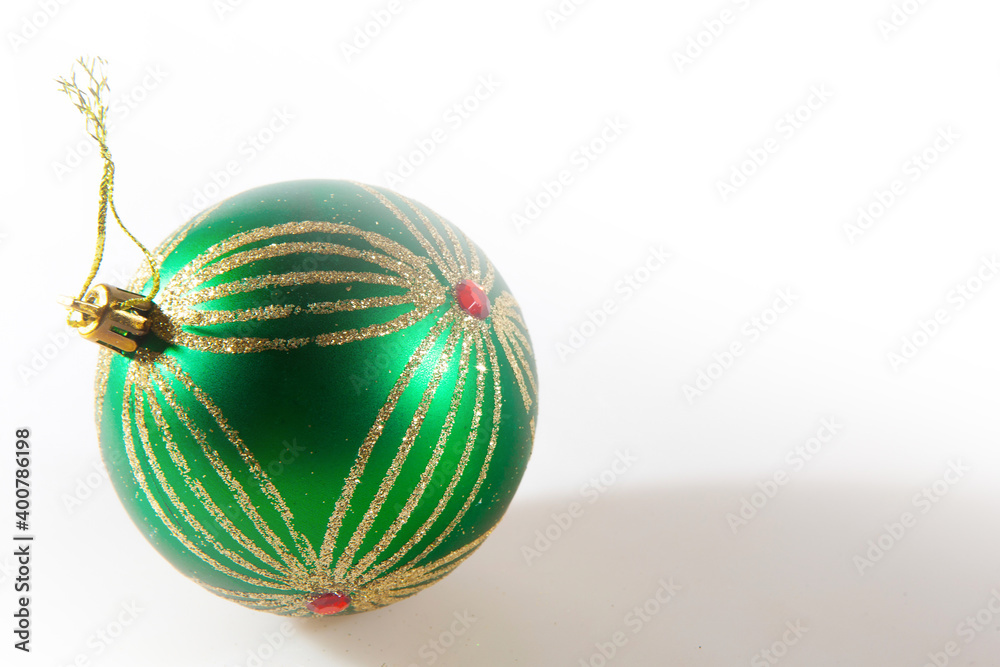 Fototapeta premium Green Christmas ball isolated on the white background
